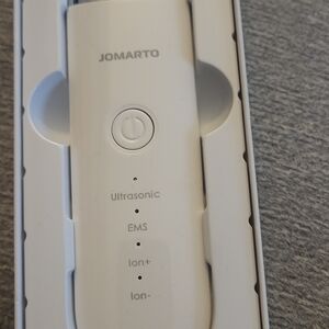 White Ultrasonic Facial Device